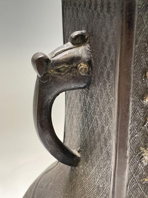 Lot 124 - A pair of Chinese bronze vases, 18th/19th...