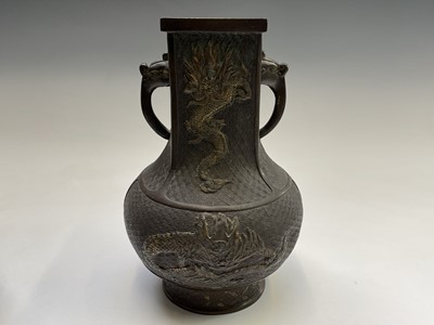 Lot 124 - A pair of Chinese bronze vases, 18th/19th...