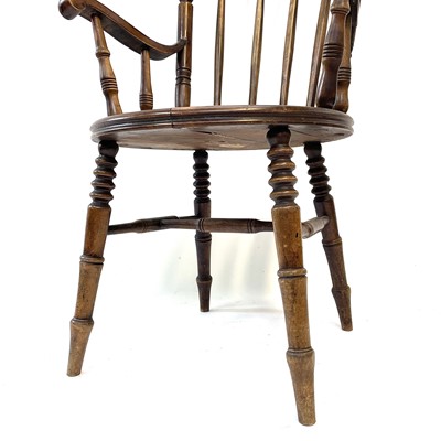 Lot 56 - A late 19th century beech wood armchair,...