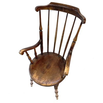 Lot 56 - A late 19th century beech wood armchair,...