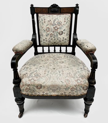 Lot 3060 - A Victorian ebonised aesthetic period armchair,...