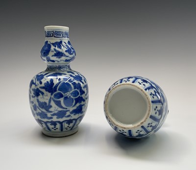 Lot 78 - A pair of Chinese double gourd porcelain vases,...