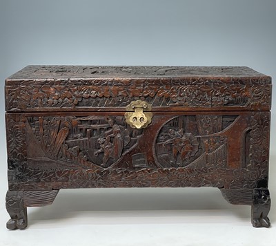 Lot 140 - A Chinese carved camphor wood chest, 20th...
