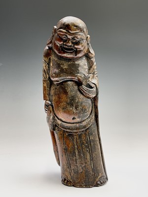 Lot 381 - A Chinese carved bamboo figure of Buddha,...