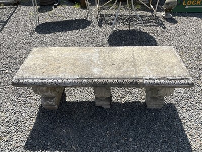 Lot 618 - A classical design garden bench raised on...