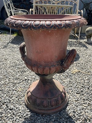 Lot 616 - A terracotta garden urn of campana form with...