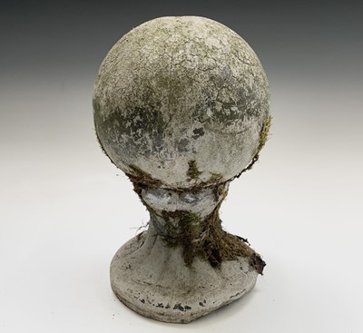 Lot 617 - A composition stone gate post ball finial....