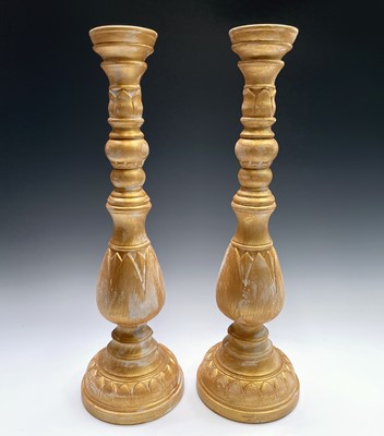 Lot 269 - A pair of large gold painted candle stands....