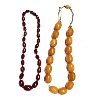 Lot 631 - Two "amber" necklaces 150gm