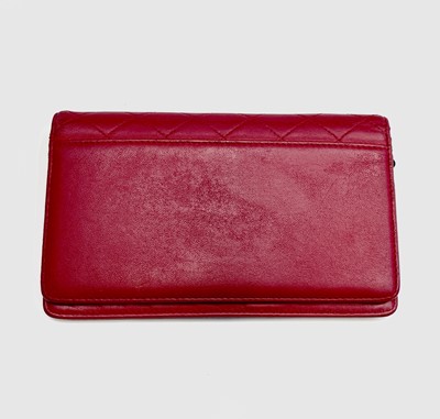 Lot 2832 - Chanel. Cerise pink lambskin leather wallet,...