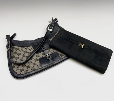 Lot 2851 - One black suede clutch bag and one other...