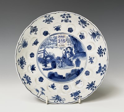 Lot 173 - A Chinese porcelain blue and white lobed dish,...