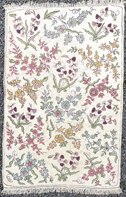 Lot 2800 - A cream ground rug/wall hanging with floral...