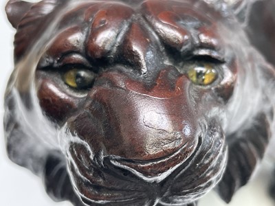 Lot 14 - A Japanese bronze model of a tiger, Meiji...