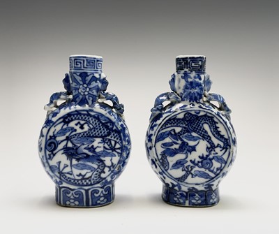 Lot 251 - A pair of small Chinese porcelain blue and...