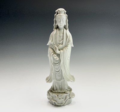 Lot 250 - A Chinese blanc de chine figure of Guanyin,...