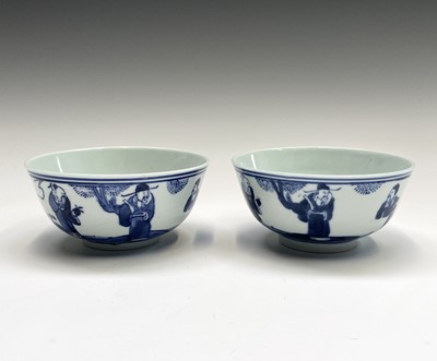 Lot 277 - A set of six Chinese blue and white rice bowls,...
