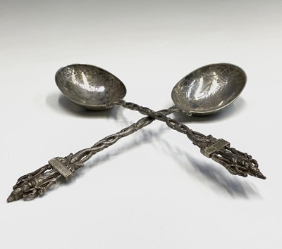 Lot 39 - A pair of Indian silver deity spoons 21cm 139.3gm
