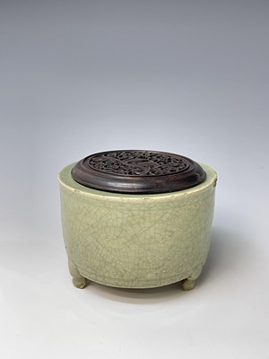 Lot 187 - A Chinese longquan celadon tripod censer, Yuan...