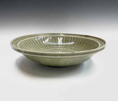 Lot 18 - A large Chinese longquan celadon bowl,...