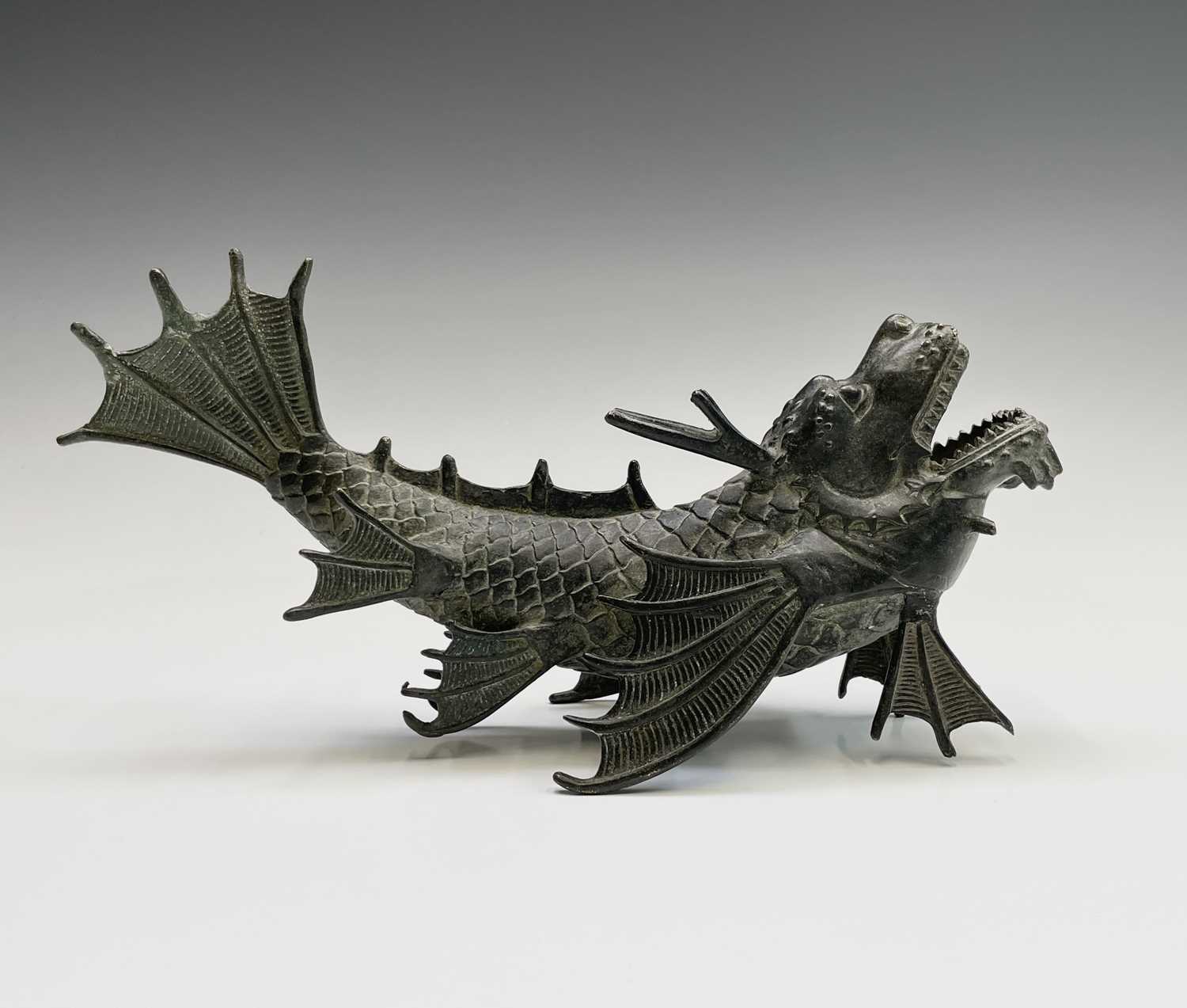 Lot 299 - A Chinese bronze figure of a dragon fish, 20th...