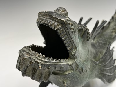 Lot 299 - A Chinese bronze figure of a dragon fish, 20th...