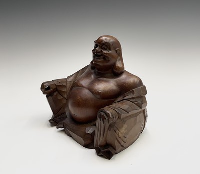 Lot 305 - A Japanese boxwood figure of a seated Buddha,...