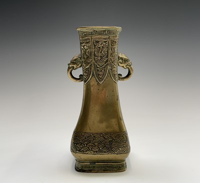 Lot 307 - A Chinese brass vase, 19th century, with twin...