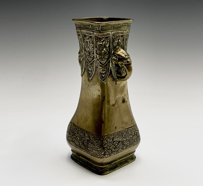 Lot 307 - A Chinese brass vase, 19th century, with twin...