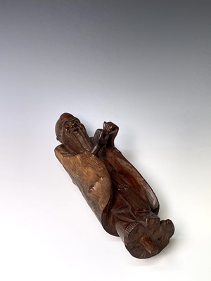 Lot 311 - A Chinese hardwood figure, carved as a bearded...
