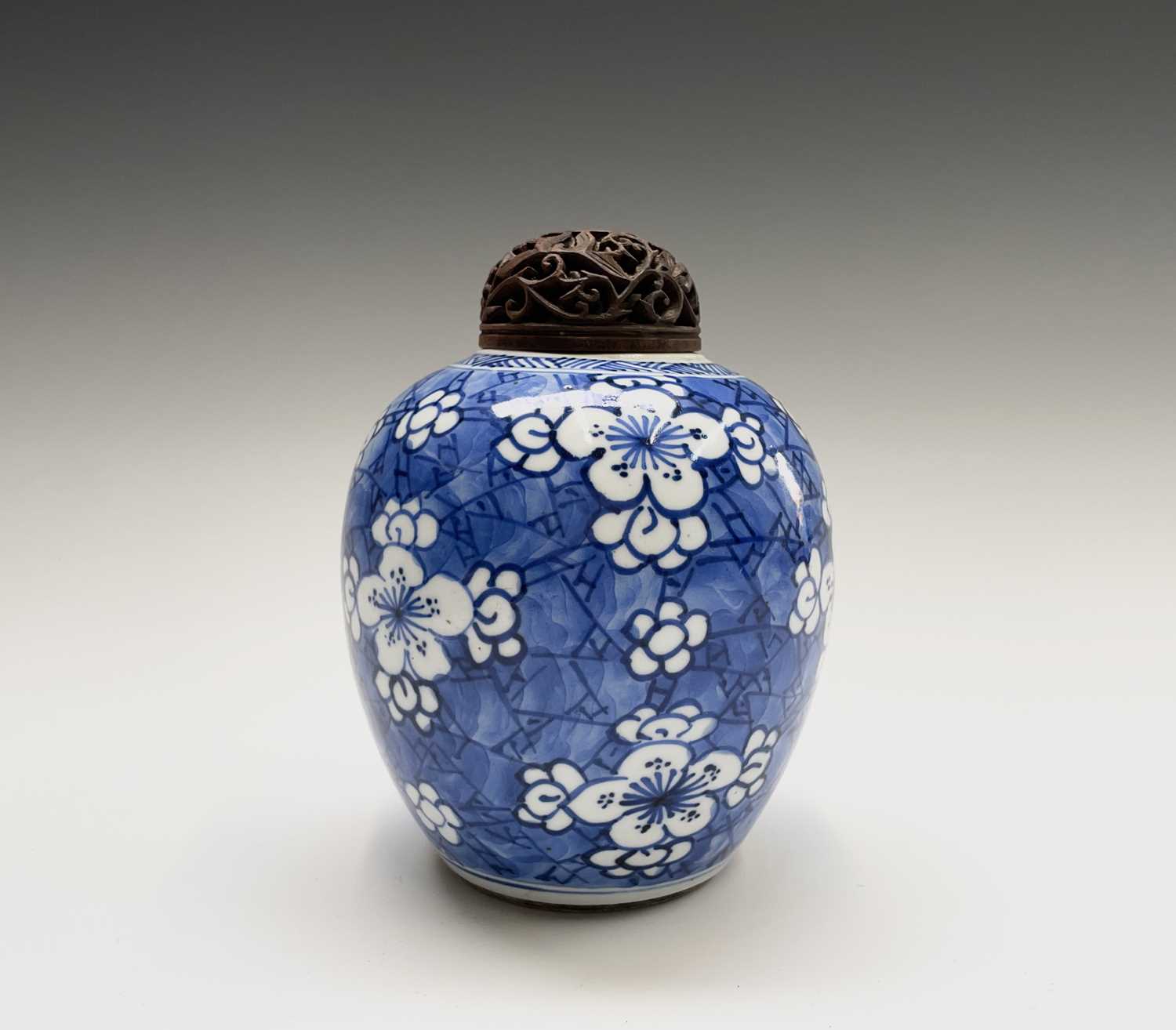 Lot 312 - A Chinese porcelain blue and white prunus...