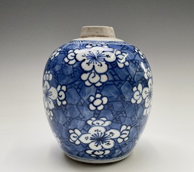 Lot 312 - A Chinese porcelain blue and white prunus...