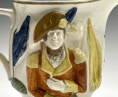 Lot 813 - A 19th century Staffordshire pottery jug,...
