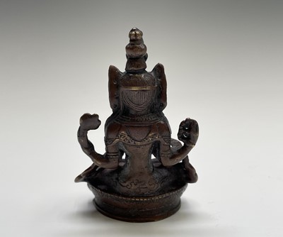 Lot 339 - A small bronze figure of a seated Buddha,...