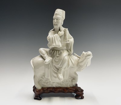 Lot 378 - A Chinese blanc de chine figure of a sage...
