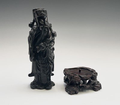 Lot 379 - A Chinese hardwood figure of an immortal, late...