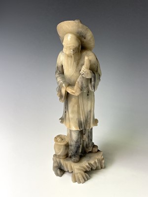Lot 383 - A Chinese white soapstone figure, 20th century,...