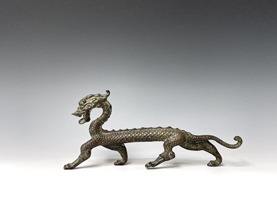 Lot 384 - A Chinese bronze figure of a dragon, 20th...
