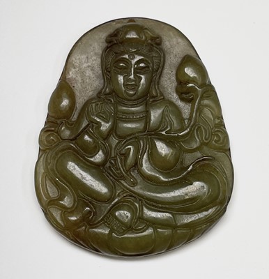Lot 386 - A Chinese jade amulet, 20th century, carved...
