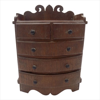 Lot 181 - A miniature mahogany bow front chest of...