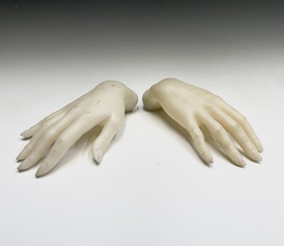 Lot 308 - Two mannequin hands. Length 22cm.