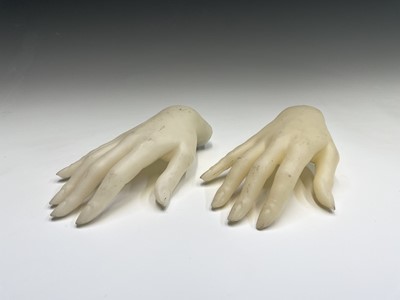 Lot 308 - Two mannequin hands. Length 22cm.