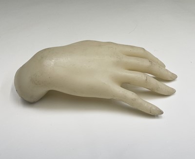 Lot 308 - Two mannequin hands. Length 22cm.