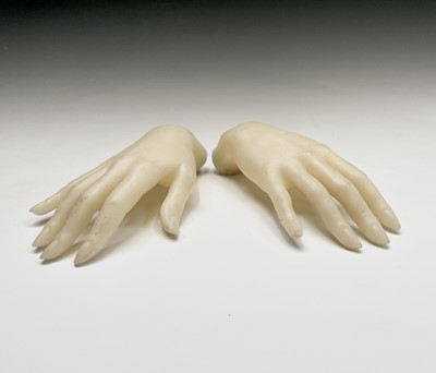 Lot 309 - Two mannequin hands. Length 22cm.