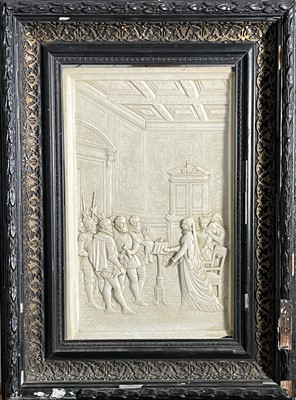 Lot 377 - A moulded plaster relief panel depicting Mary...