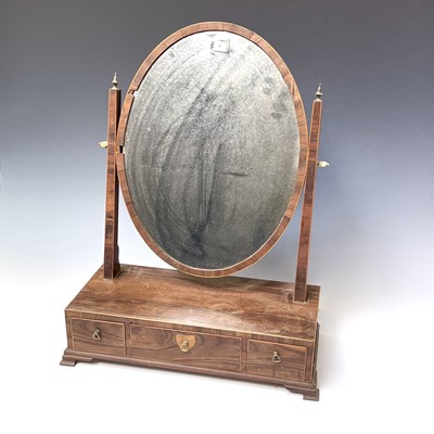 Lot 3085 - A George III coromandel oval swing toilet...