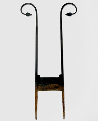 Lot 626 - A wrought iron boot scraper, in the Arts and...