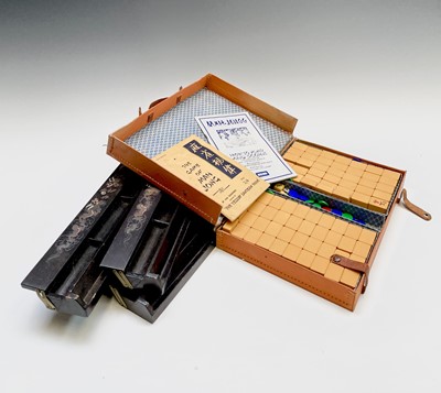 Lot 420 - A Chinese cased mahjong set, with celluloid...