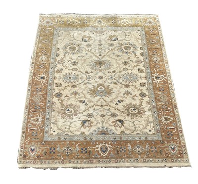 Lot 1285 - A Ziegler Chobi carpet, the ivory ground with...