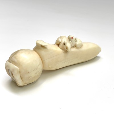 Lot 310 - A Japanese ivory carving of mice and fruit,...